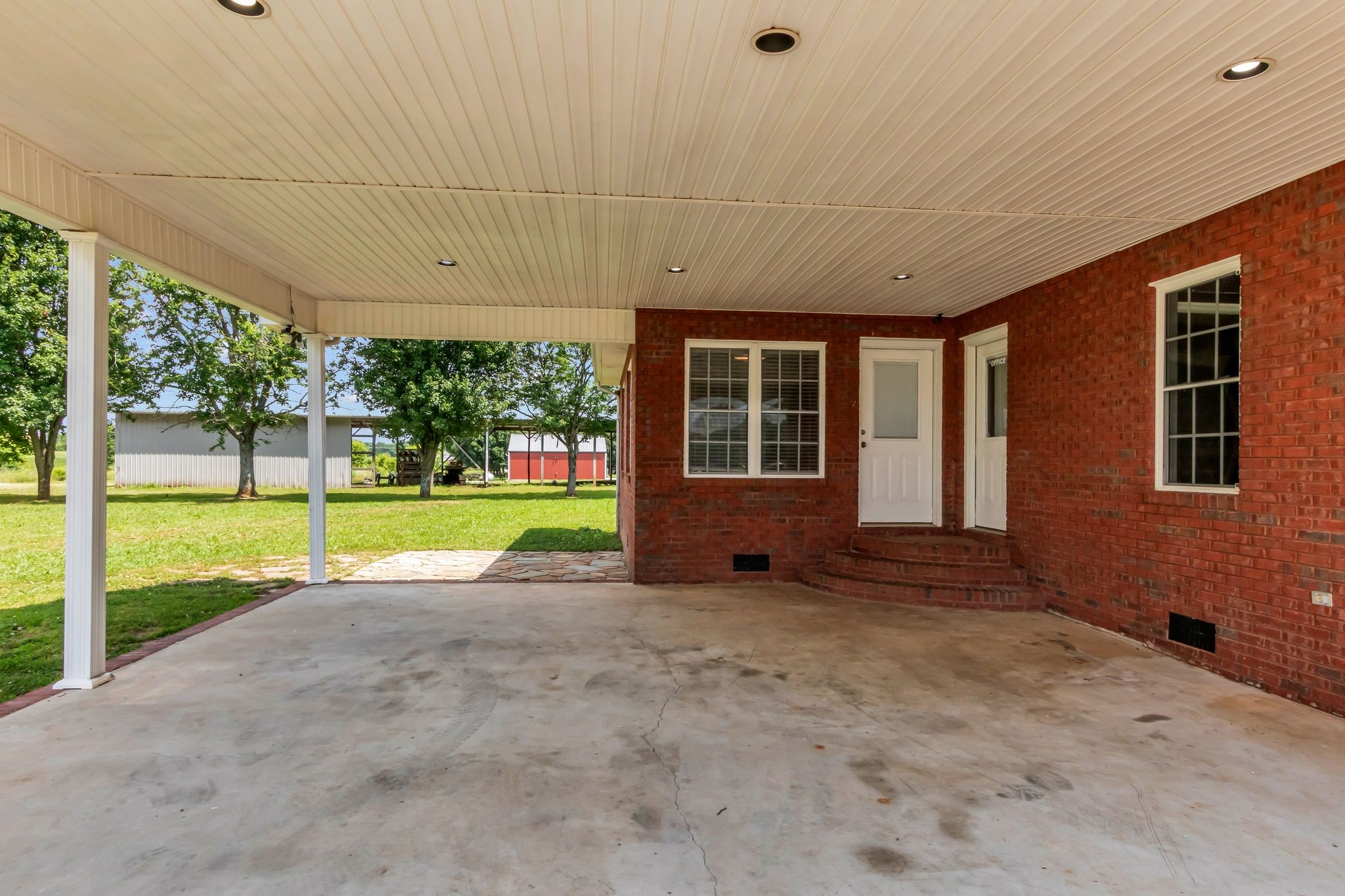 184 Buncombe Road Belvidere, TN 37306 - Photo 29 of 33 a view of a house with a big yard and large tree