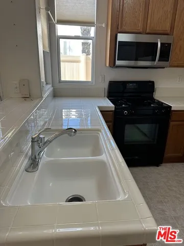 a bathroom with a bathtub and a sink