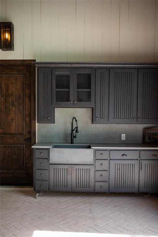 5000 T W King Road Southlake, TX 76092 - Photo 28 of 40 Convenient barn alley kitchenette, perfect for quick access to drinks and snacks.