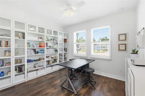 an aerial view of residential houses with outdoor space