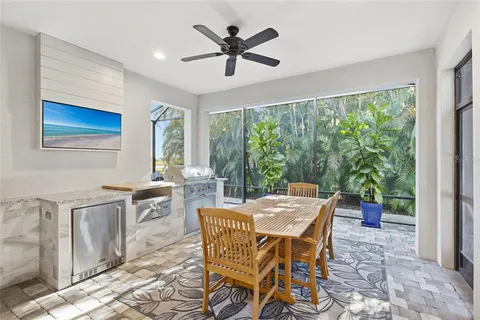 a view of a park with iron fence