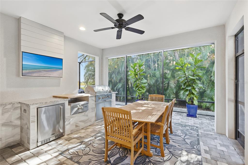 12106 Perennial Place Lakewood Ranch, FL 34211 - Photo 31 of 66 a view of a dining room with furniture window and outside view