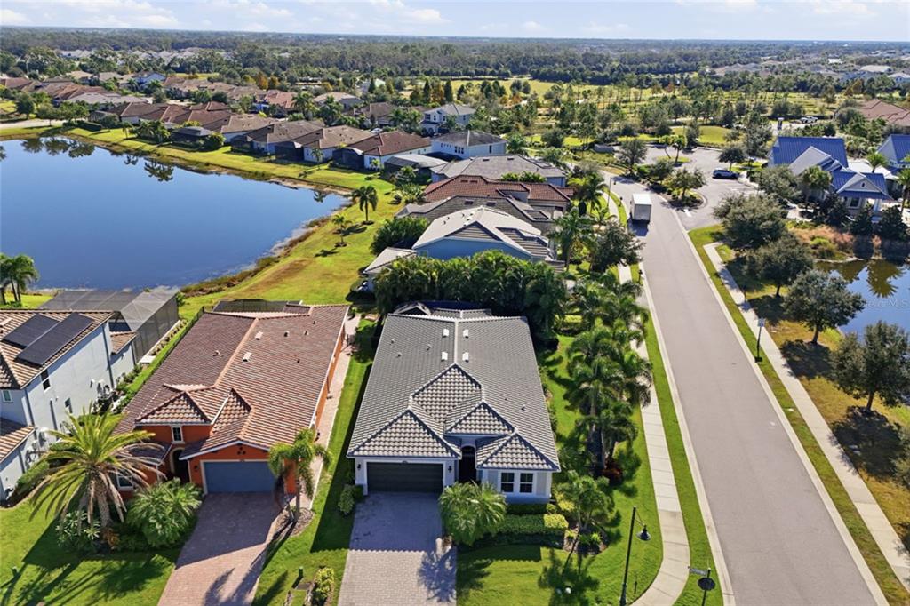 12106 Perennial Place Lakewood Ranch, FL 34211 - Photo 34 of 66 an aerial view of residential houses with outdoor space