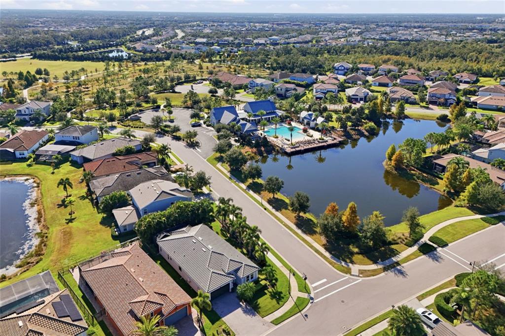 12106 Perennial Place Lakewood Ranch, FL 34211 - Photo 36 of 66 an aerial view of residential houses with outdoor space