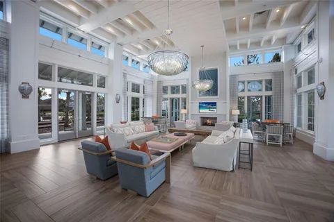 a front view of house with yard and swimming pool