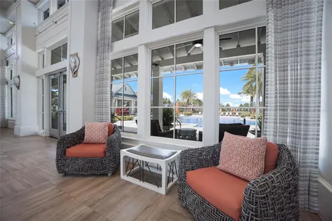 a view of a swimming pool with a patio