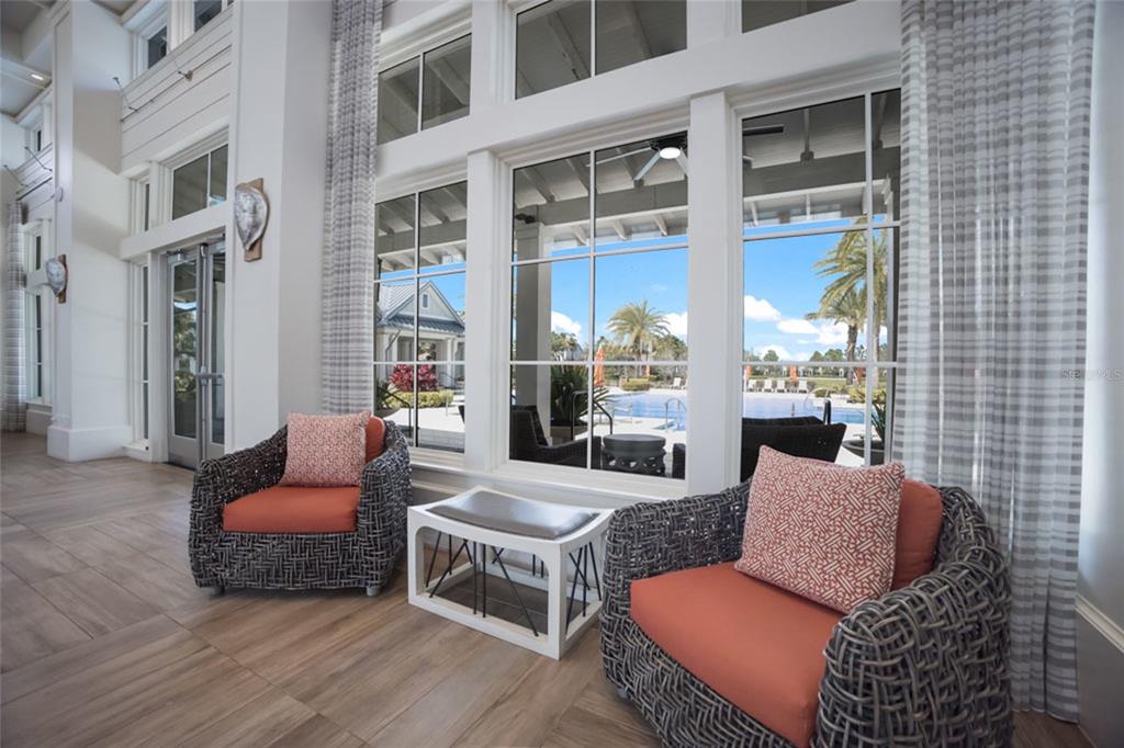 12106 Perennial Place Lakewood Ranch, FL 34211 - Photo 47 of 66 a outdoor living space with furniture and a potted plant