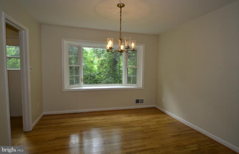 2306 Short Ridge Road Reston, VA 20191 - Photo 3 of 21 The dining room has a bay window & great views.