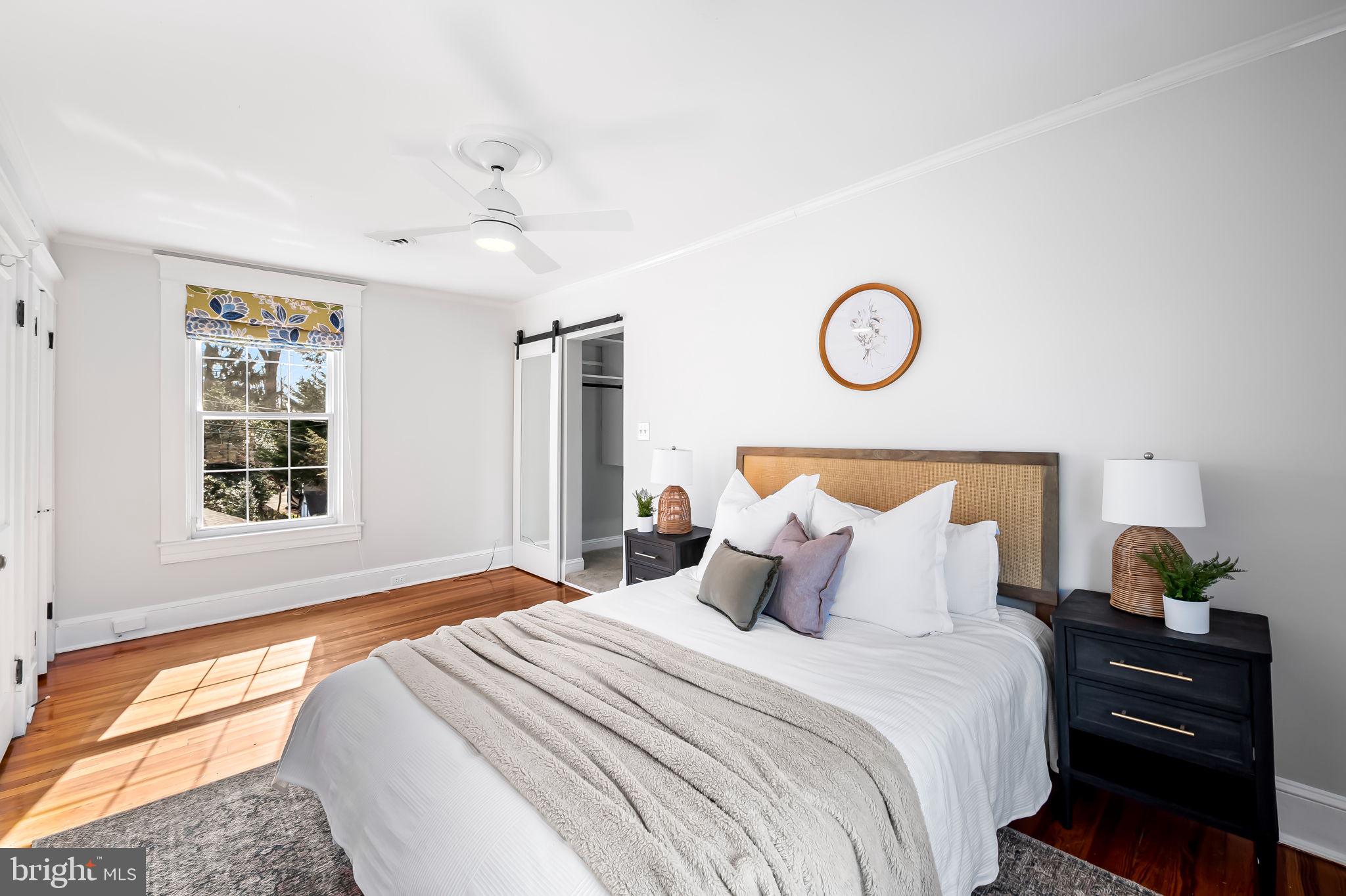 703 Chumleigh Road Baltimore, MD 21212 - Photo 25 of 41 a bedroom with a bed and a window