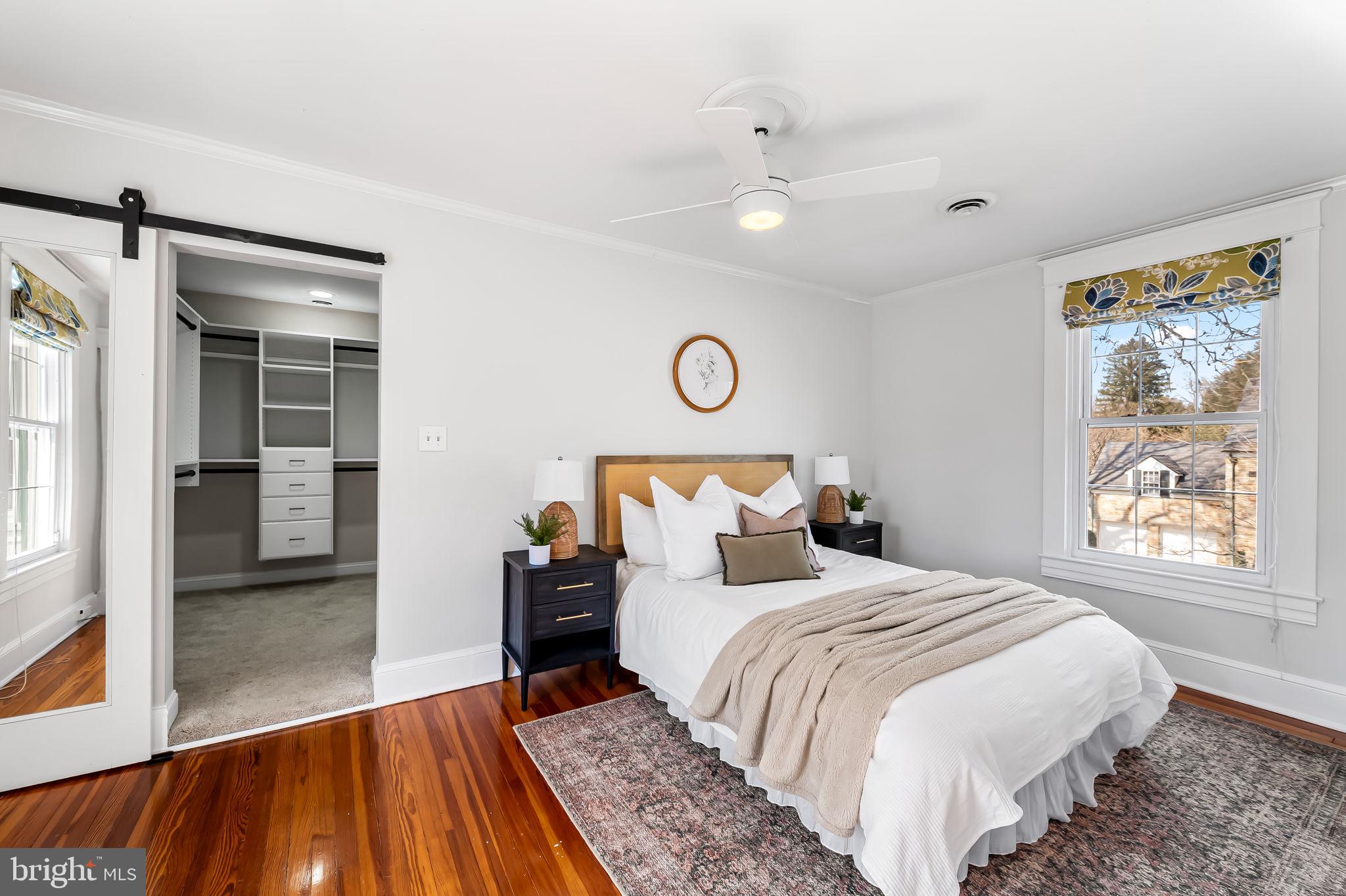 703 Chumleigh Road Baltimore, MD 21212 - Photo 26 of 41 a bedroom with a large bed and a window