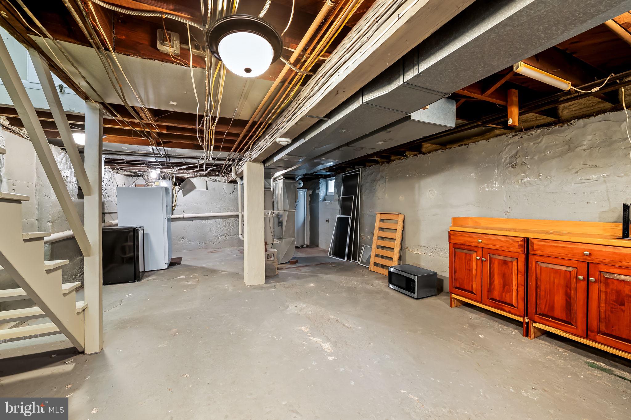 703 Chumleigh Road Baltimore, MD 21212 - Photo 33 of 41 a view of a room with wooden walls