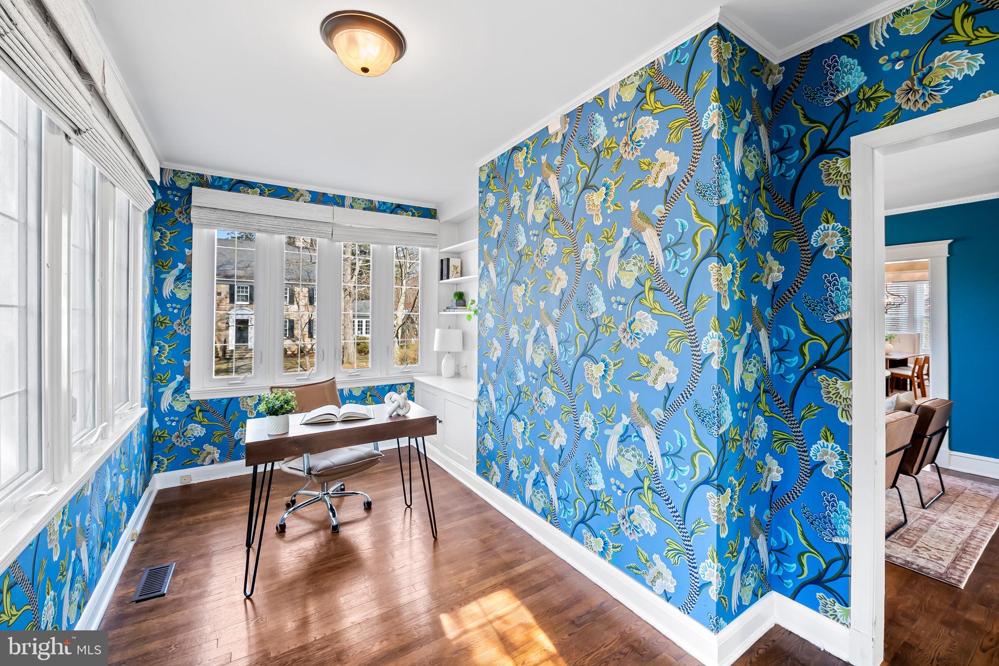 703 Chumleigh Road Baltimore, MD 21212 - Photo 9 of 41 a reading room with furniture and a wooden floor