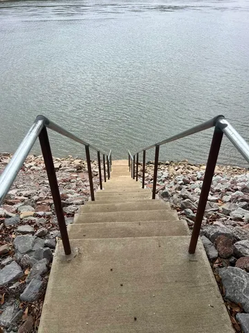 a view of a backyard with sitting area