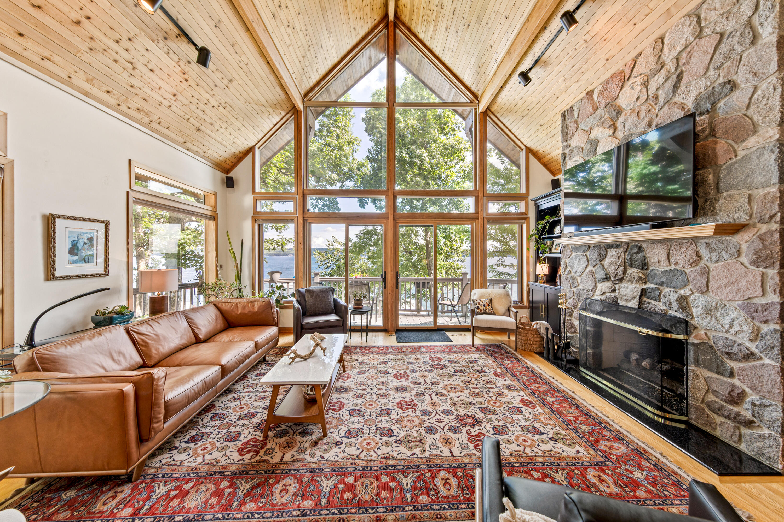 4 Dartmouth Road Williams Bay, WI 53191 - Photo 11 of 43 Great room with soaring ceilings + gas fireplace
