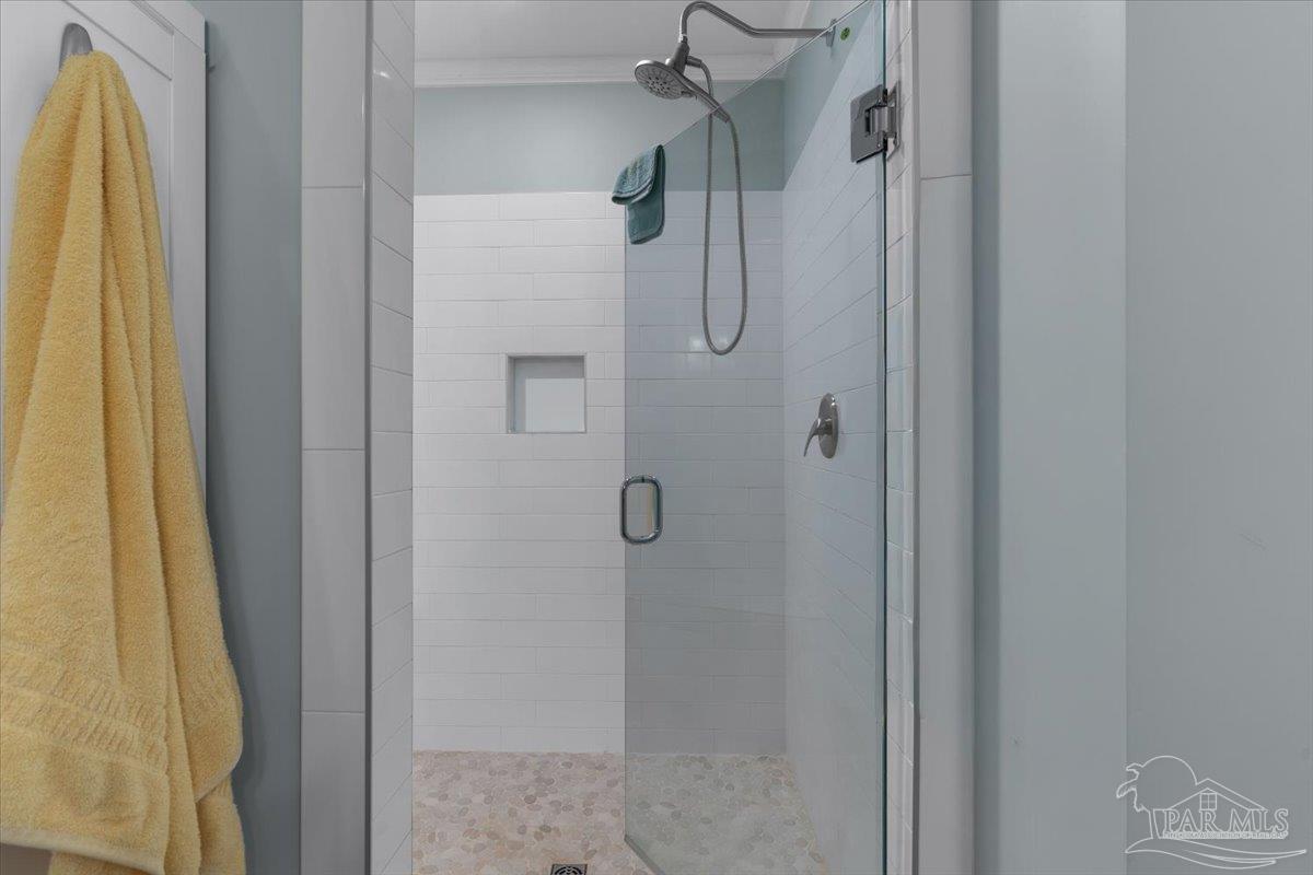 4955 Blue Ribbon Drive Milton, FL 32583 - Photo 18 of 32 a bathroom with a shower