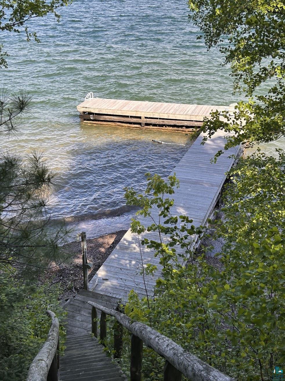 1596 North Shore Road La Pointe, WI 54850 - Photo 16 of 21 Private wooden dock extending into the water with an attached ladder