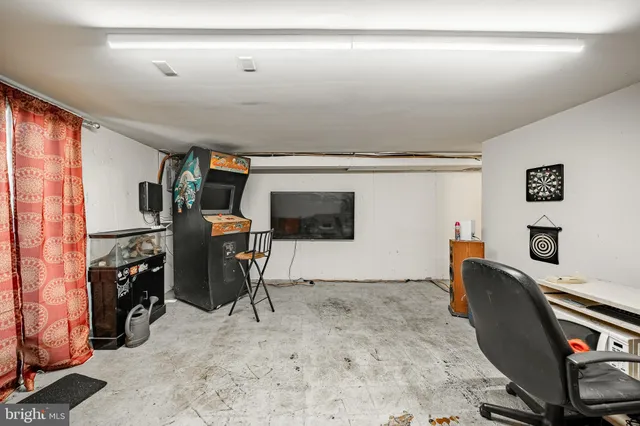 a workspace with furniture and a window