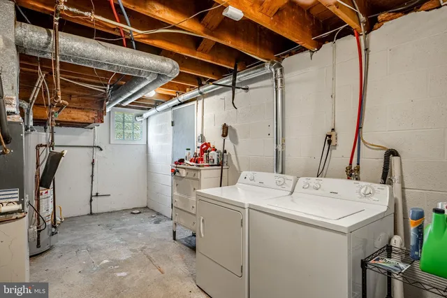 a utility room with dryer and washer