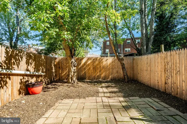 a view of a backyard of the house