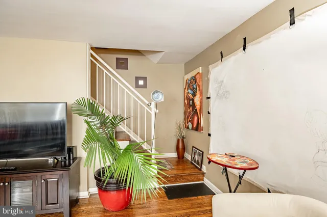 a ocean view with seating space and potted plants