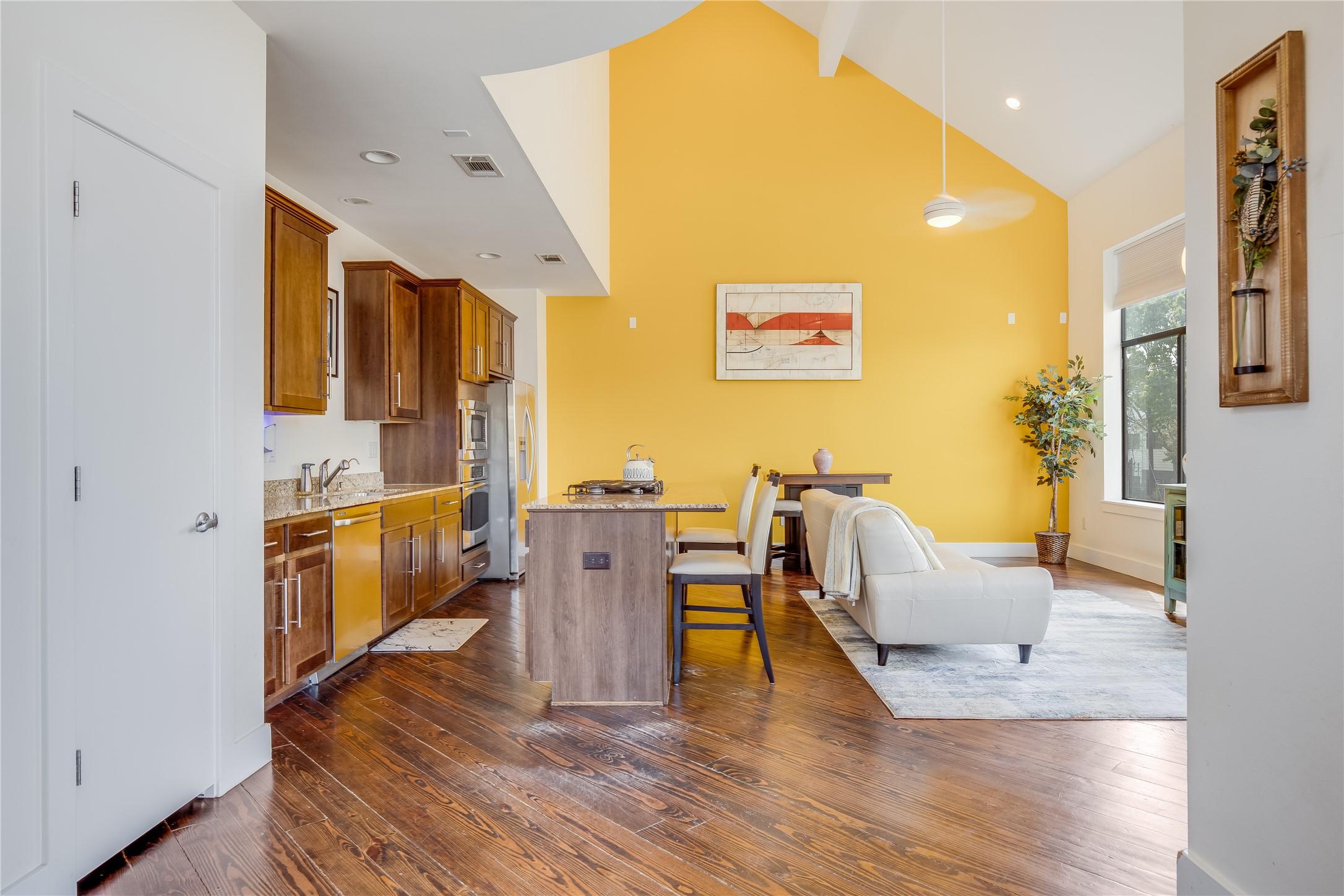 2205 Bastrop Street Houston, TX 77003 - Photo 11 of 31 a living room with furniture and a kitchen