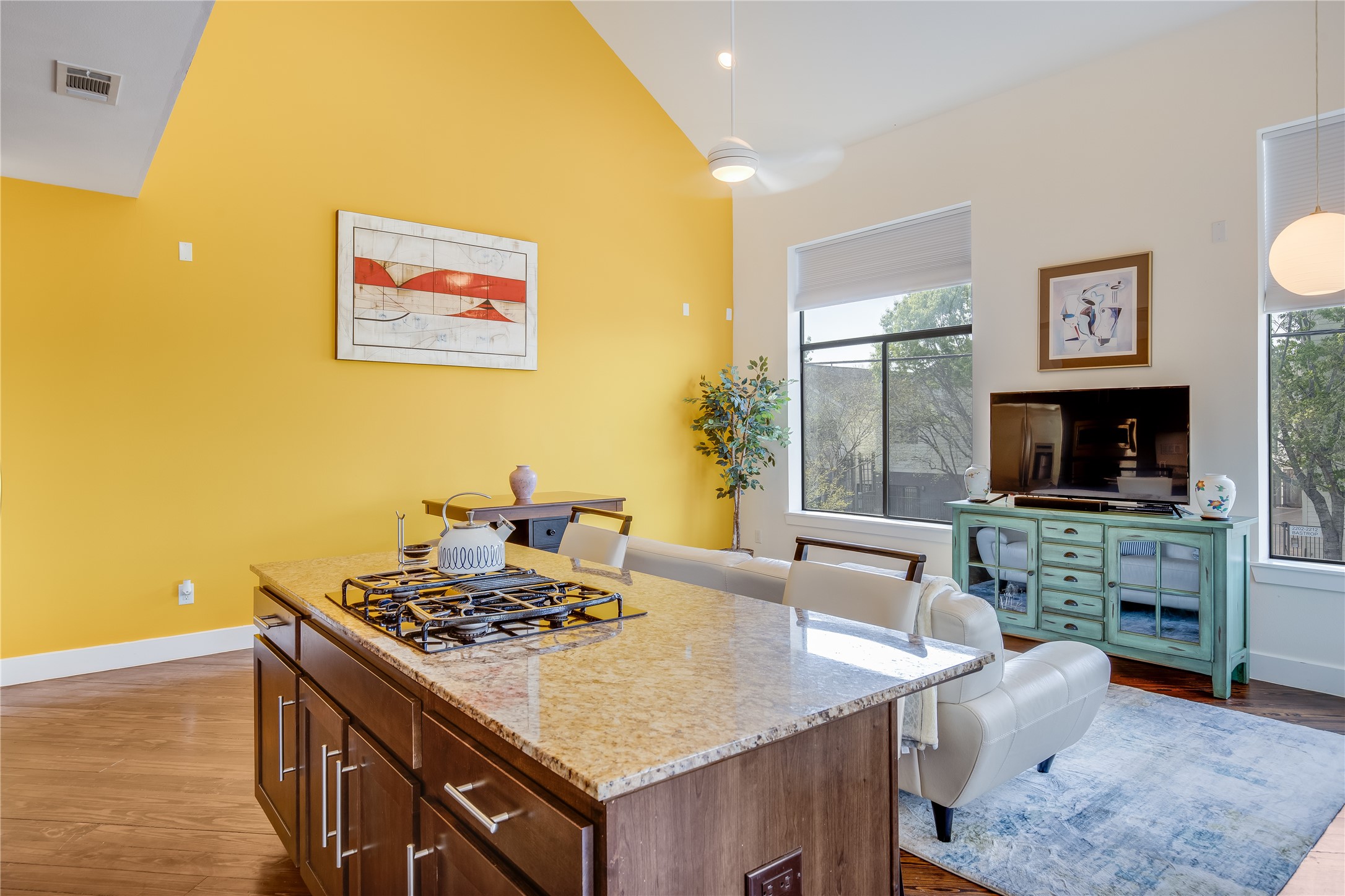 2205 Bastrop Street Houston, TX 77003 - Photo 12 of 31 a kitchen with a stove and a flat screen tv