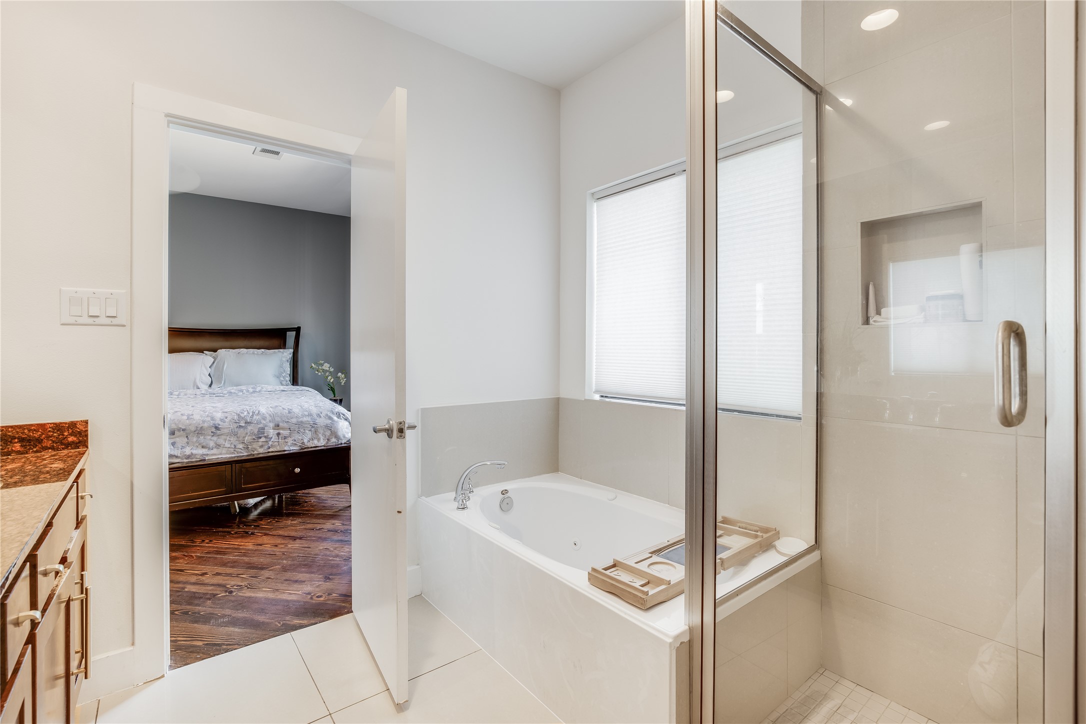 2205 Bastrop Street Houston, TX 77003 - Photo 19 of 31 a bathroom with a tub and shower