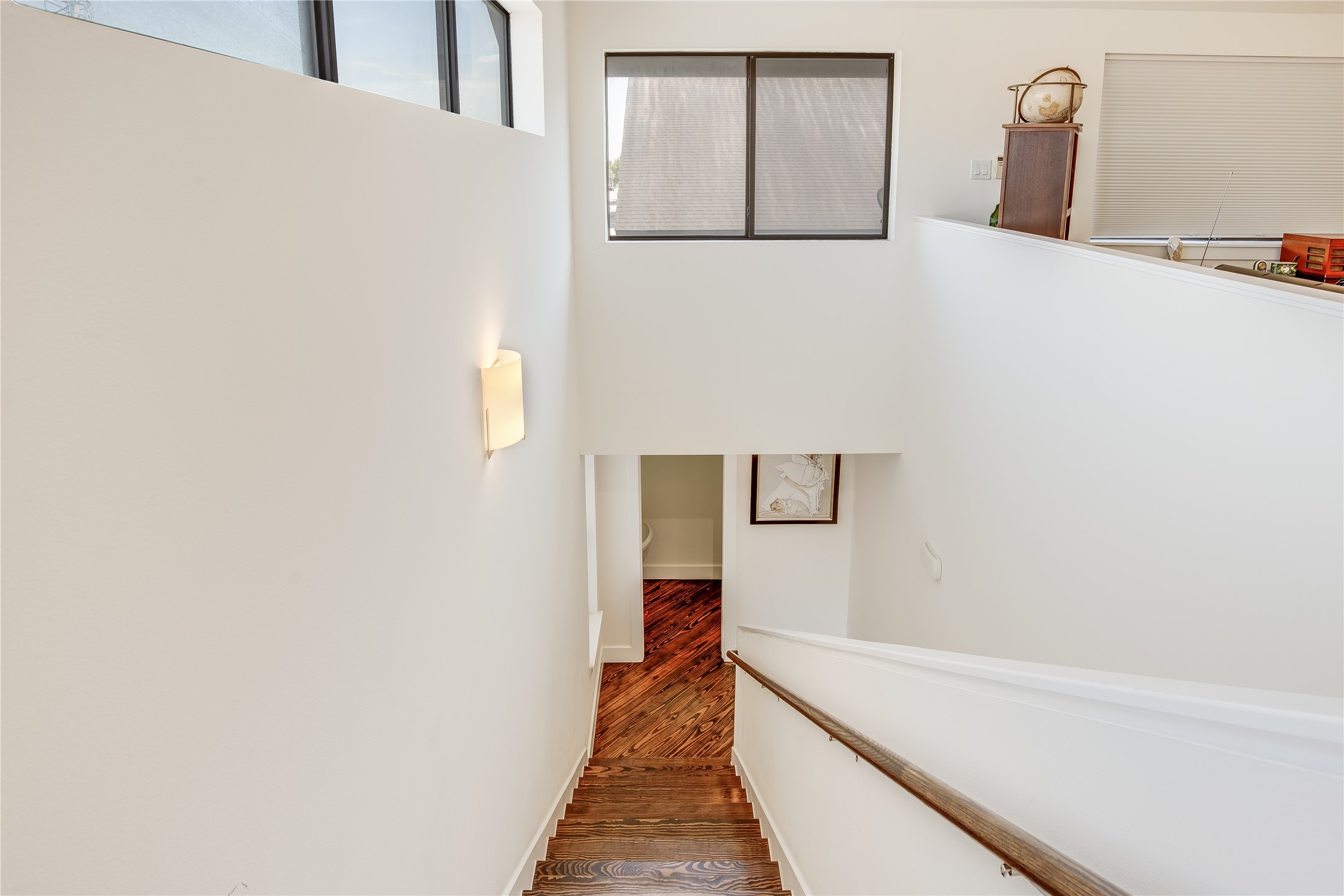 2205 Bastrop Street Houston, TX 77003 - Photo 23 of 31 a hallway with sliding door and wooden floor