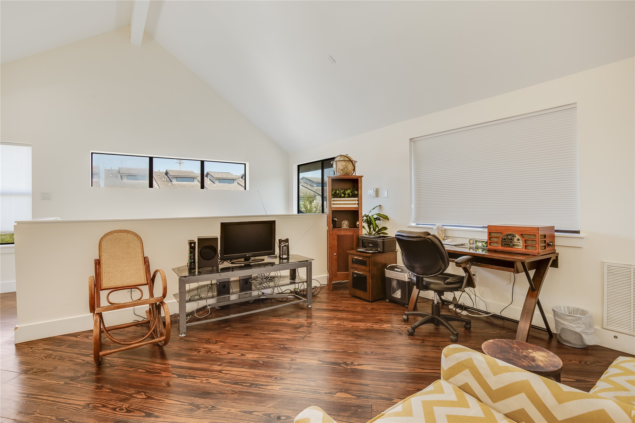 2205 Bastrop Street Houston, TX 77003 - Photo 24 of 31 a view of a workspace with furniture and a flat screen tv