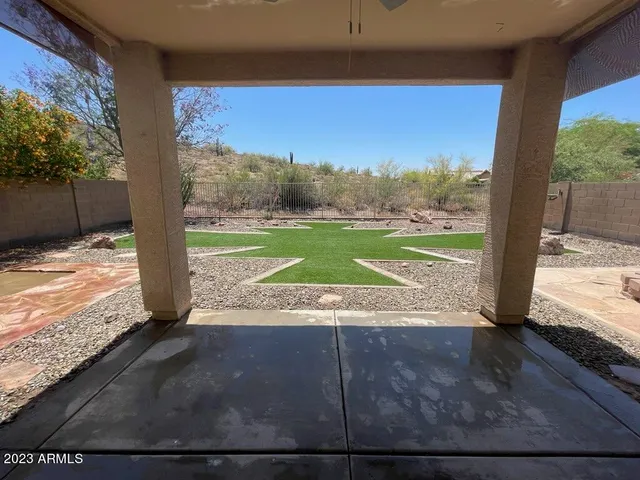 a view of a yard with mountain view