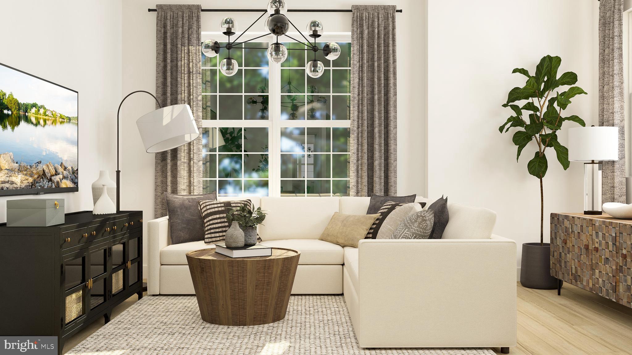 45 Bennet Fld Way Robbinsville, NJ 08691 - Photo 7 of 23 a living room with furniture and a potted plant