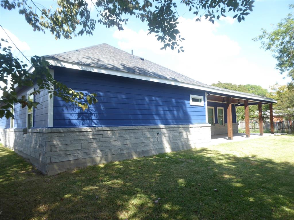 230 Third Street Wilmer, TX 75172 - Photo 30 of 40 a view of house with yard