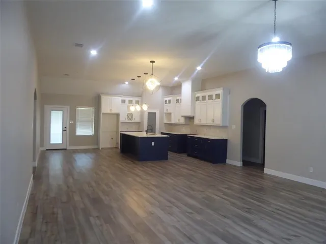 a view of kitchen and windows