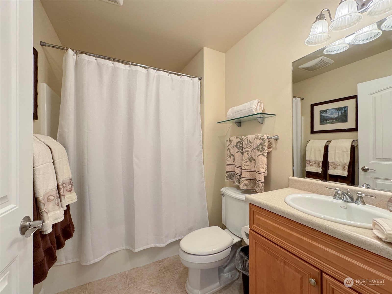 359 Dungeness Meadows Sequim, WA 98382 - Photo 21 of 37 a bathroom with a granite countertop sink toilet and a mirror