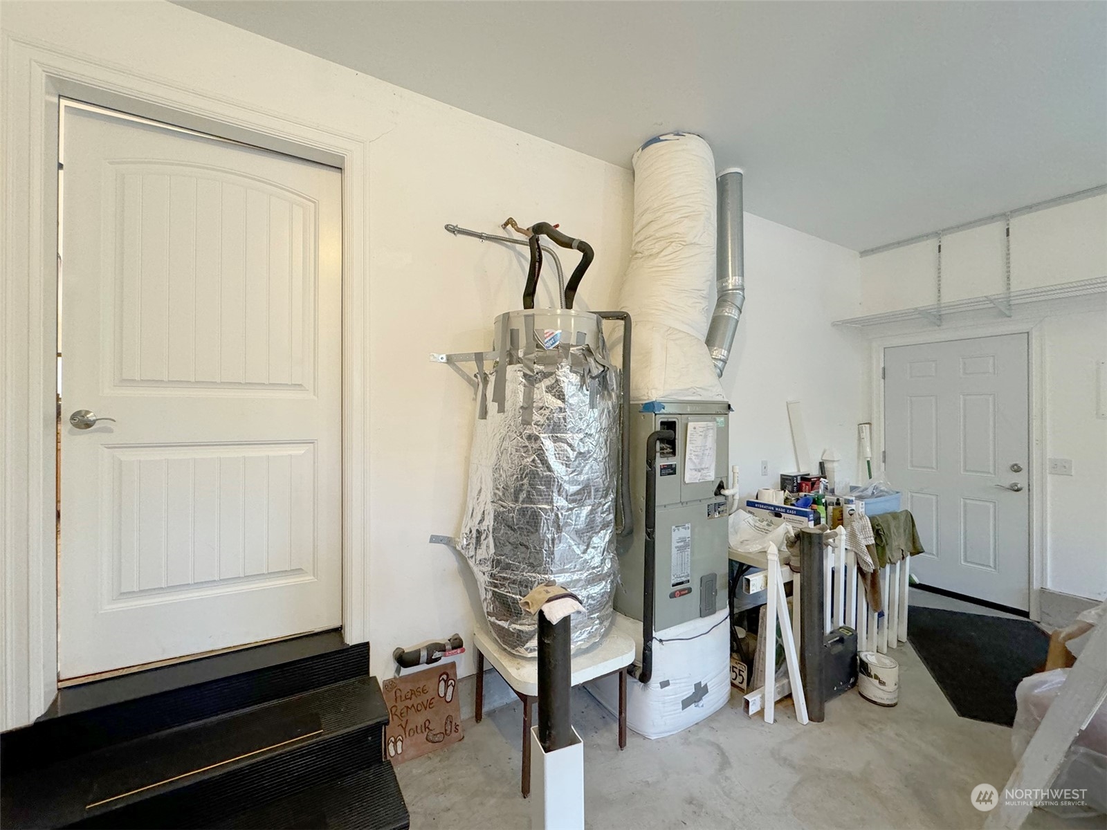 359 Dungeness Meadows Sequim, WA 98382 - Photo 30 of 37 a room with gym equipment and wooden floor