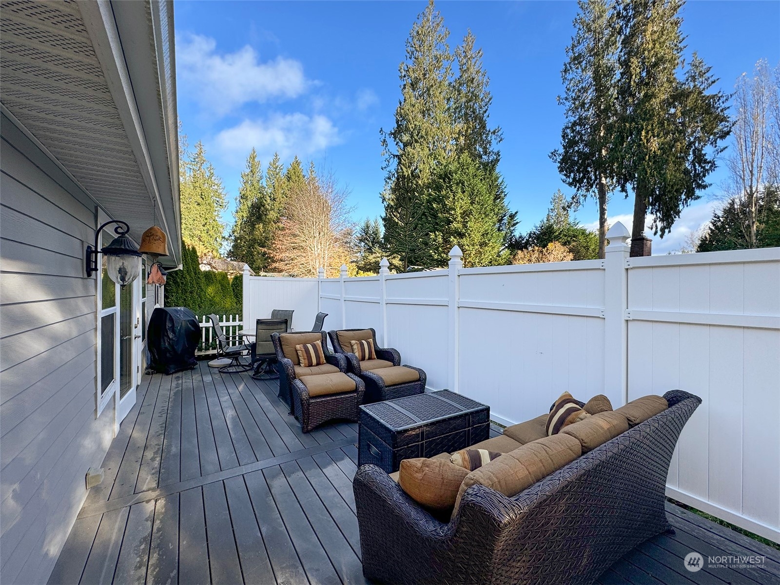 359 Dungeness Meadows Sequim, WA 98382 - Photo 32 of 37 a backyard of a house with seating space