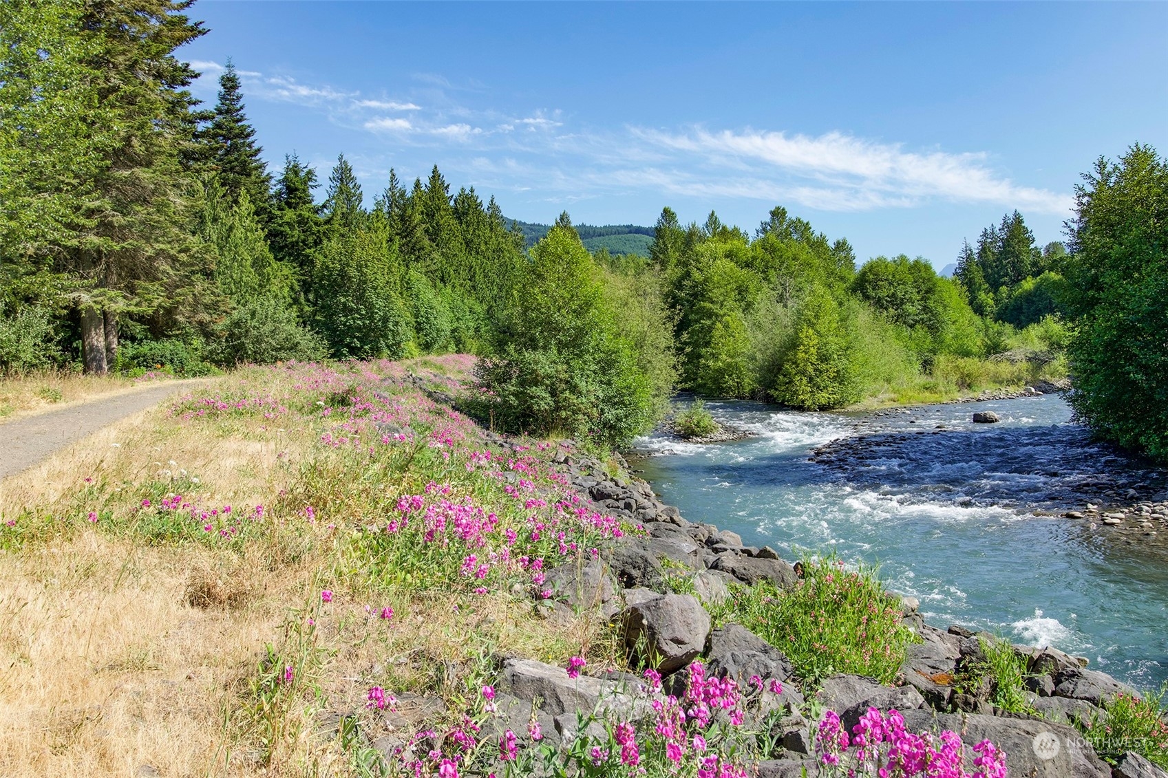 359 Dungeness Meadows Sequim, WA 98382 - Photo 37 of 37 a view of a pathway with a flower garden in the back