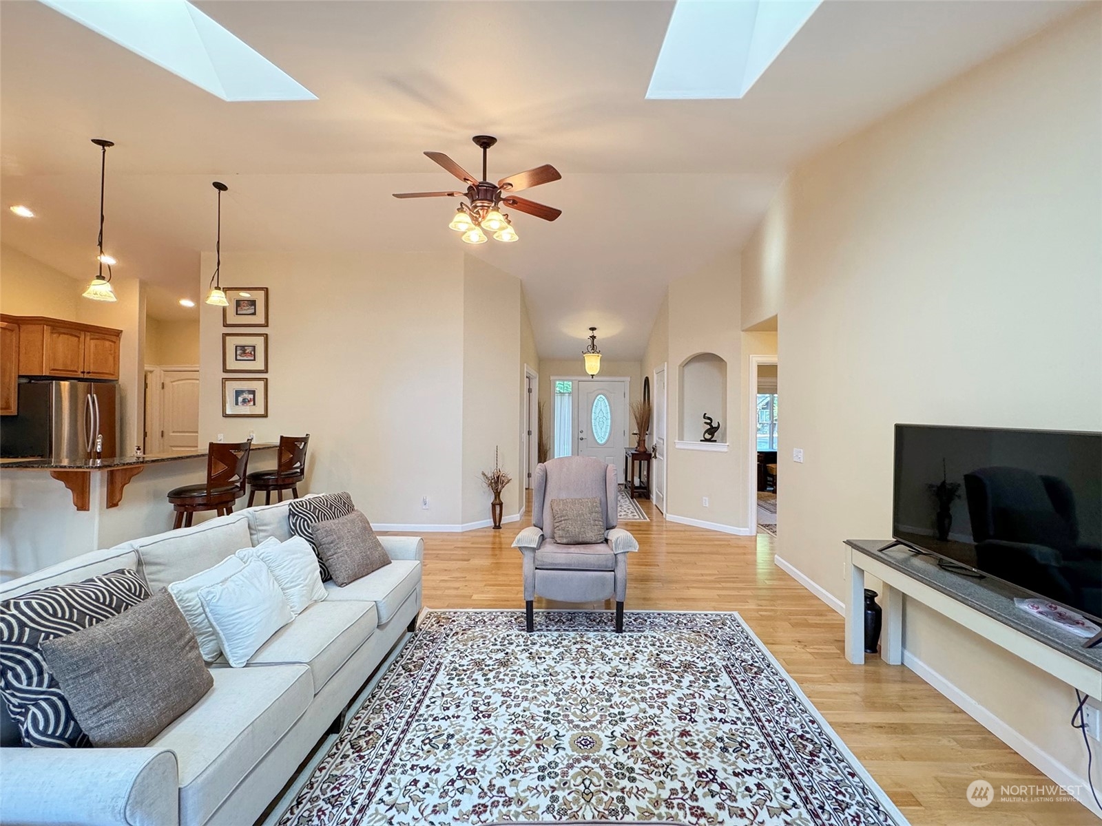 359 Dungeness Meadows Sequim, WA 98382 - Photo 6 of 37 a living room with furniture and a flat screen tv