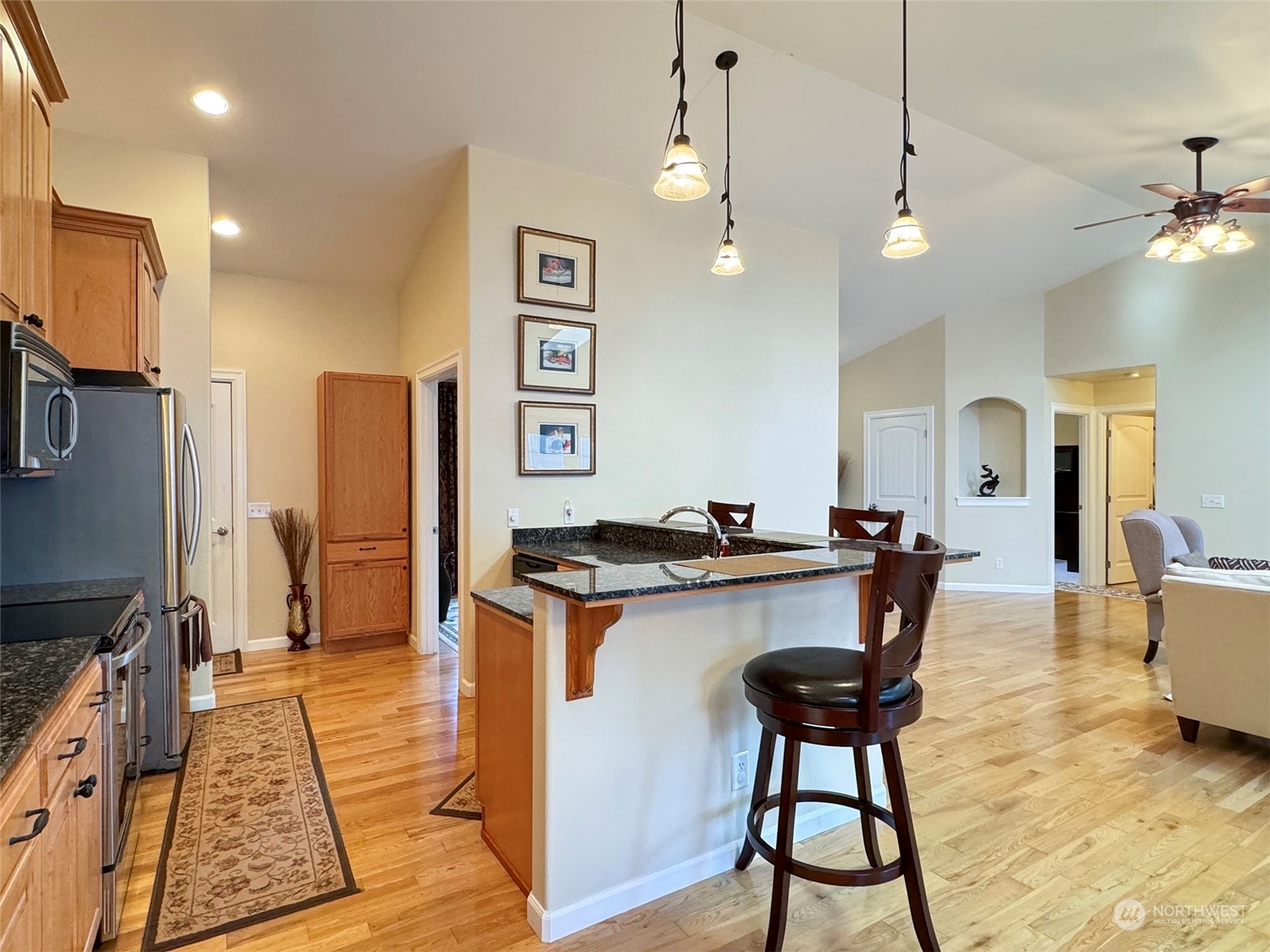 359 Dungeness Meadows Sequim, WA 98382 - Photo 8 of 37 a view of a kitchen and dining room