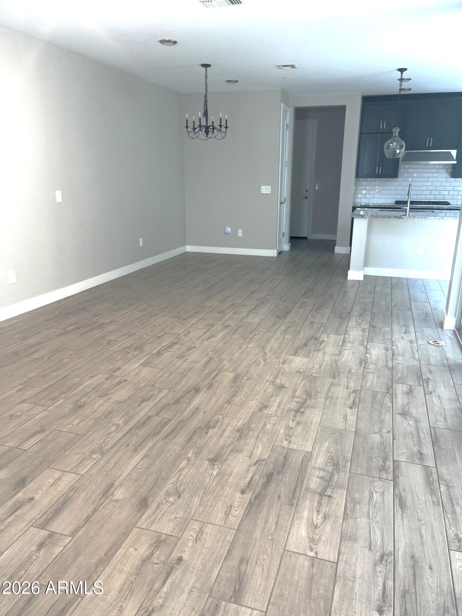 3855 South McQueen Road, Unit 21 Chandler, AZ 85286 - Photo 4 of 28 20250711_230227103_iOS