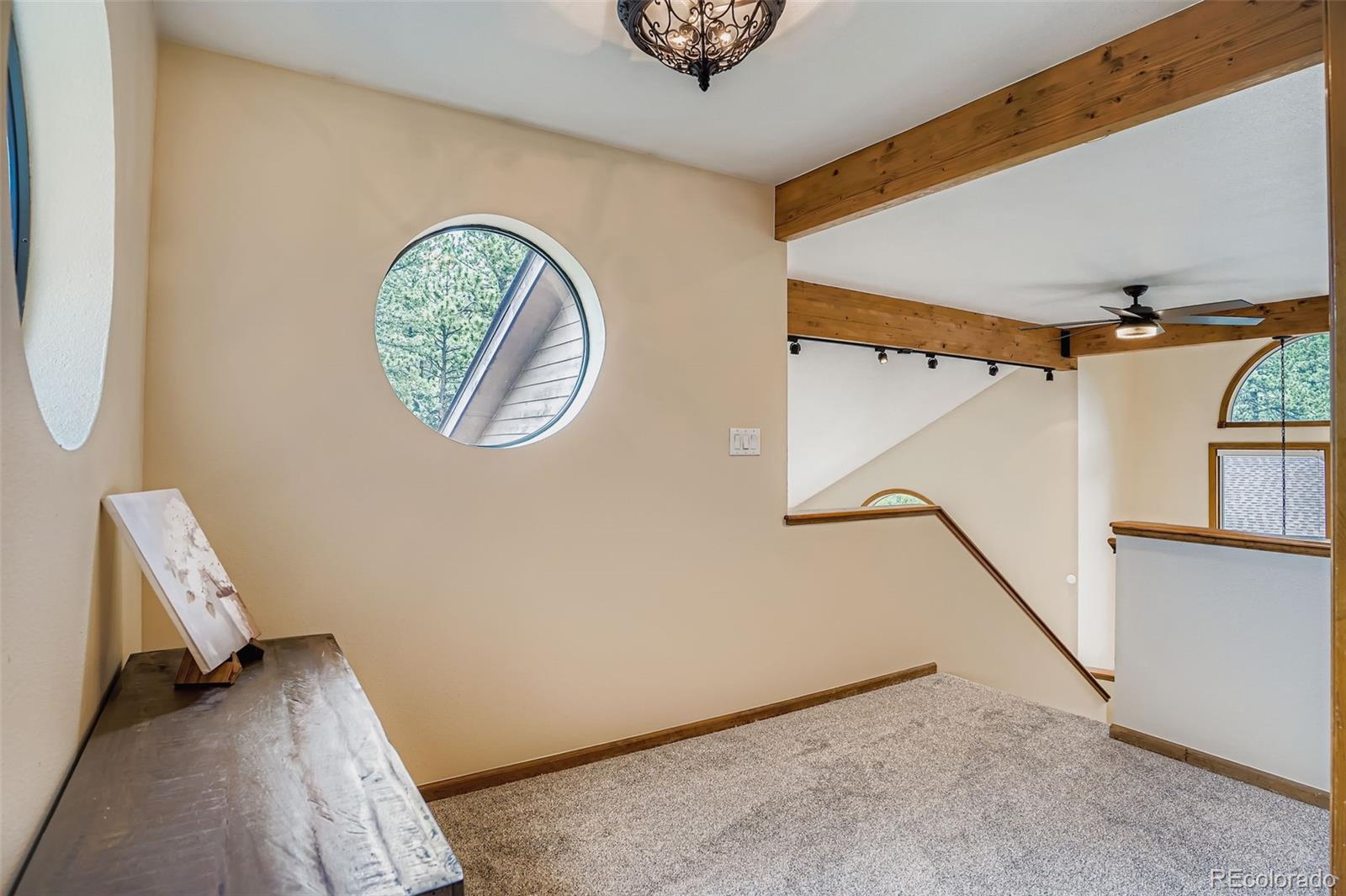 13342 Douglass Ranch Drive Pine, CO 80470 - Photo 21 of 31 a view of a hallway with entryway