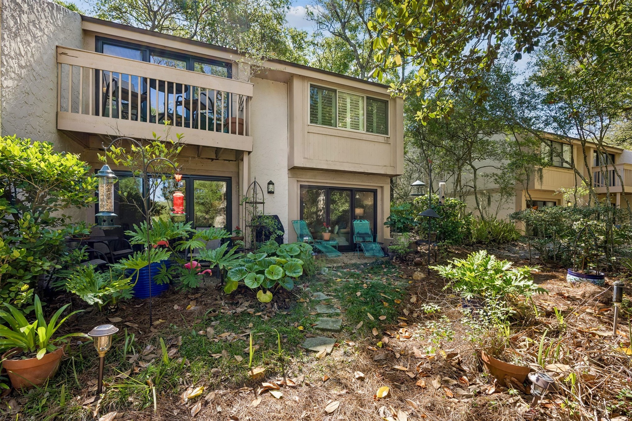 2005 Beachwood Road, Unit 2005 Amelia Island, FL 32034 - Photo 26 of 43 a house view with a garden space
