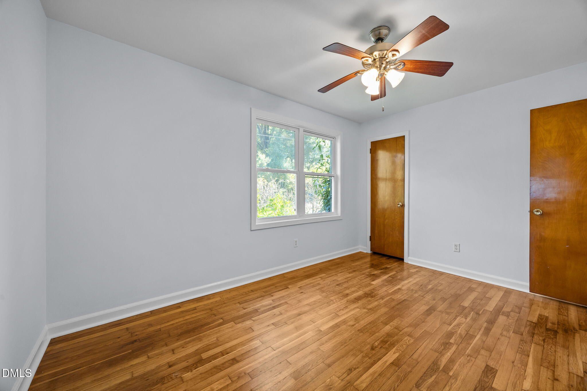2231 Rumson Road Raleigh, NC 27610 - Photo 26 of 45 a view of an empty room with a window