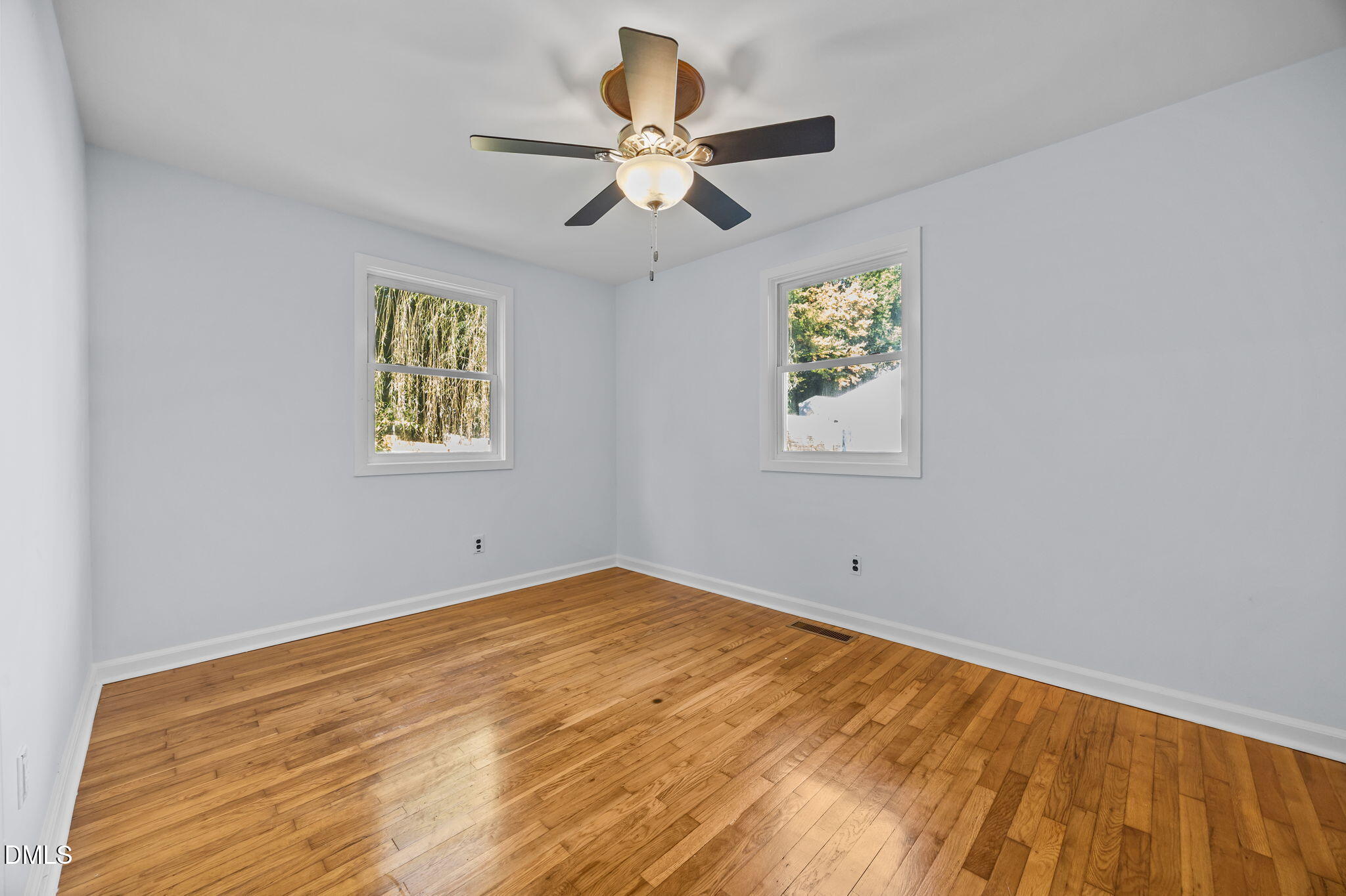 2231 Rumson Road Raleigh, NC 27610 - Photo 27 of 45 a view of an empty room with a window