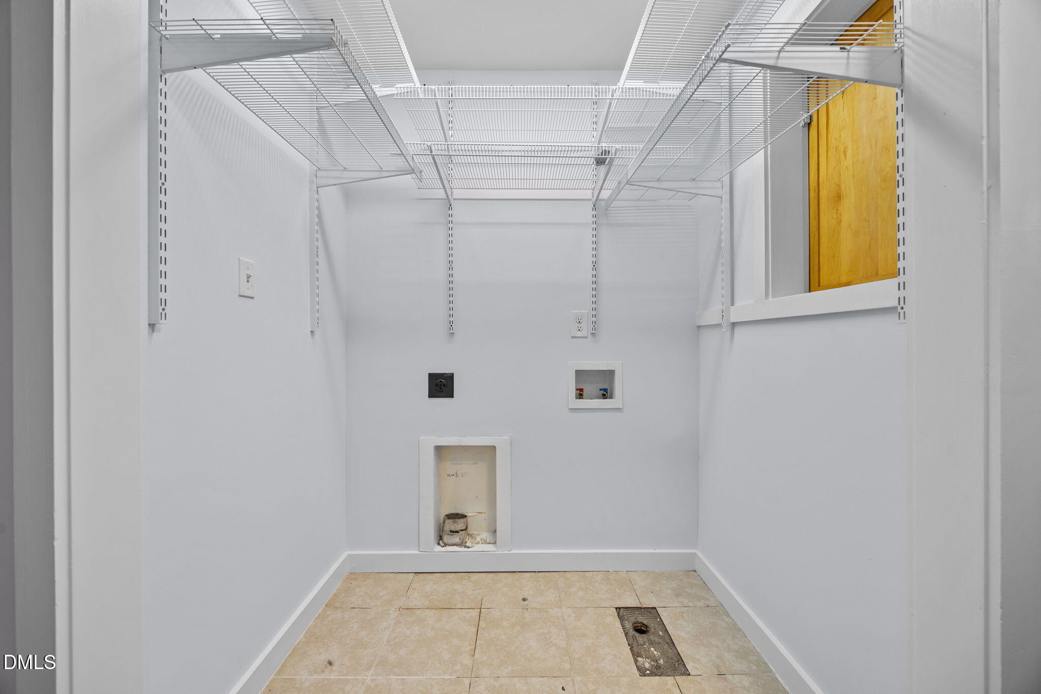 2231 Rumson Road Raleigh, NC 27610 - Photo 29 of 45 a view of walk in closet with window