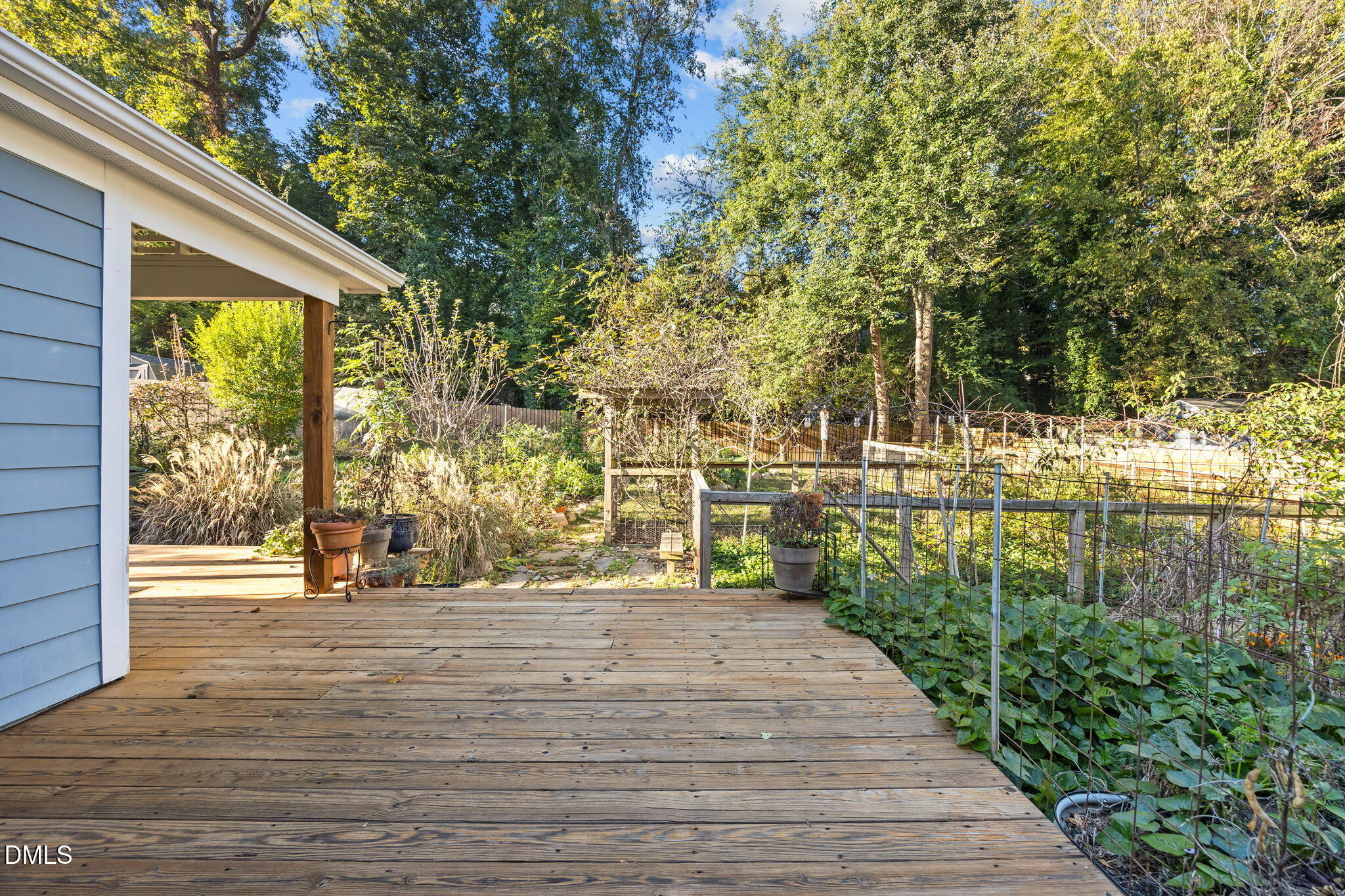 2231 Rumson Road Raleigh, NC 27610 - Photo 9 of 45 a view of a pathway both side of building