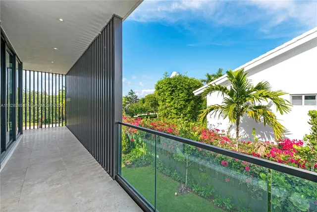 a view of a garden from a balcony