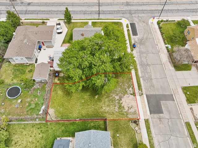 385 East Randall Way South, Unit 2 Centerville, UT 84014 - Photo 1 of 21 Aerial perspective of suburban area with property parcel outlined