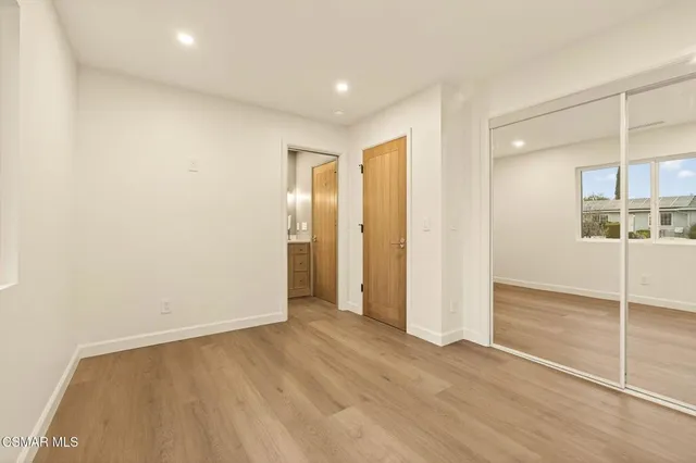 a view of a livingroom with wooden floor