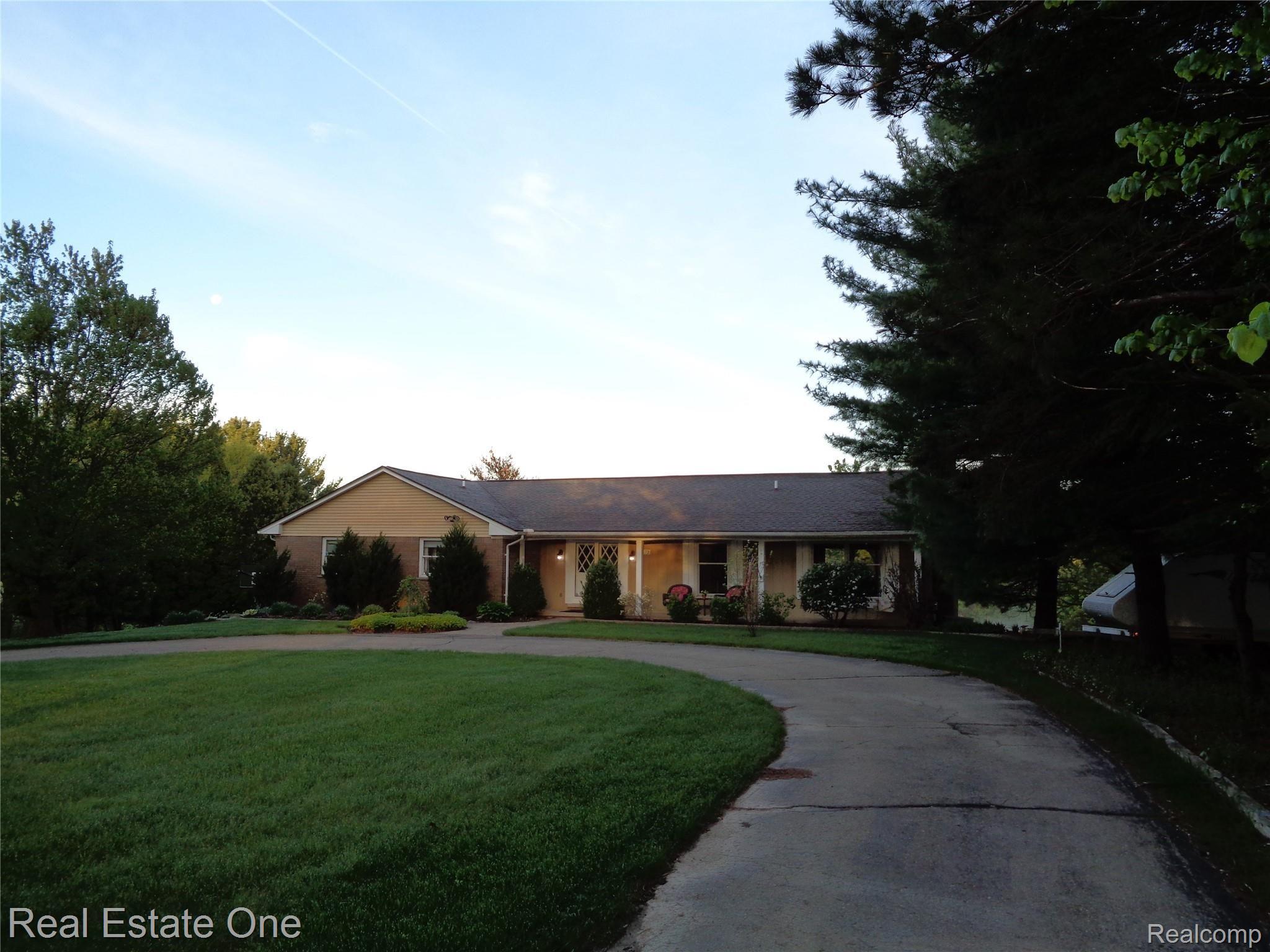 2572 Lake George Road Oakland, MI 48363 - Photo 58 of 83 Rounded driveway; one of two driveways on property.
